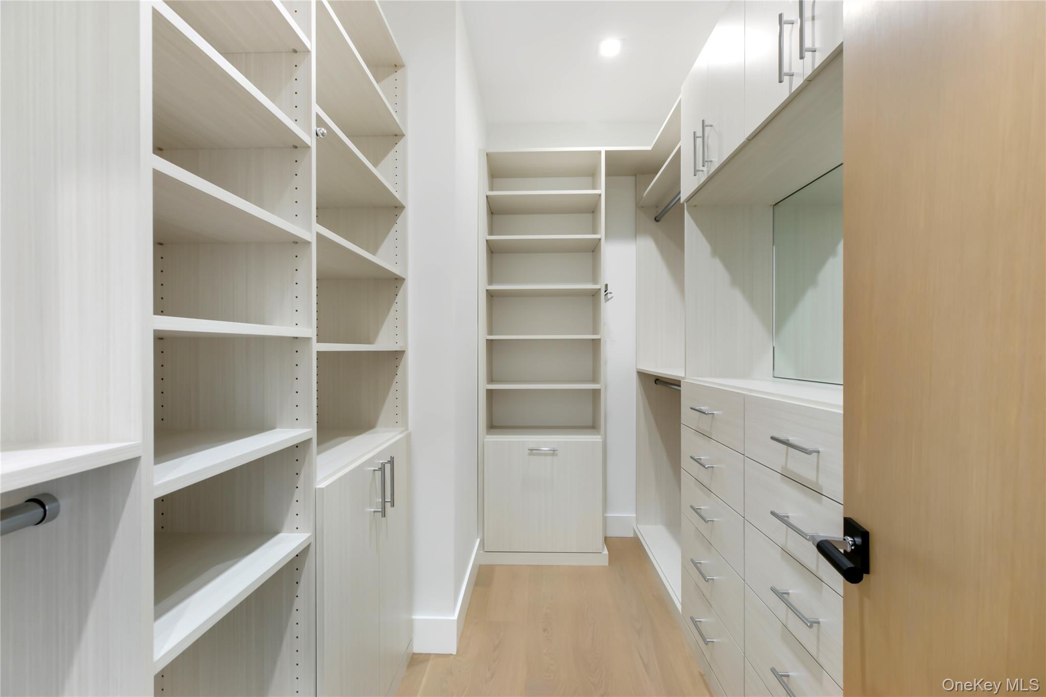 158 Cobb Road Water Mill, NY 11976 - Photo 24 of 43 Walk in closet featuring light wood-style flooring