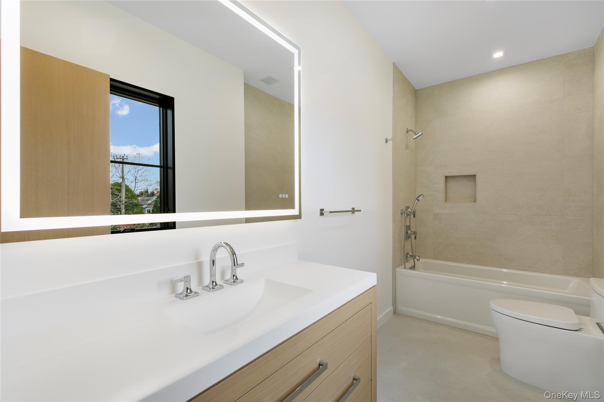 158 Cobb Road Water Mill, NY 11976 - Photo 29 of 43 Bathroom with vanity and washtub / shower combination