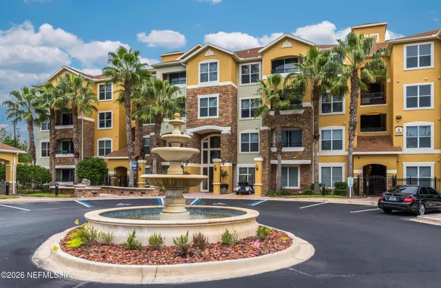 a view of a building with a street