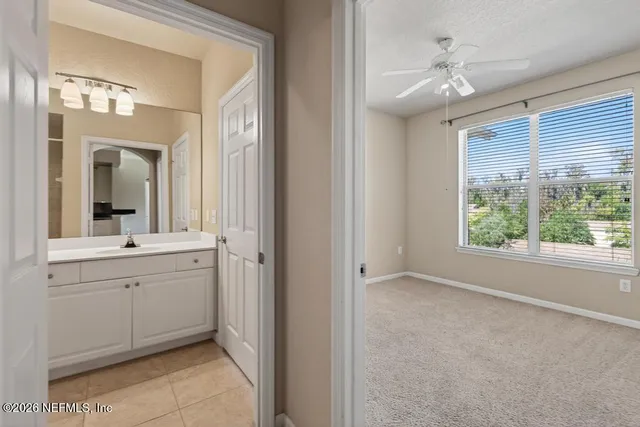 an empty room with a bathroom