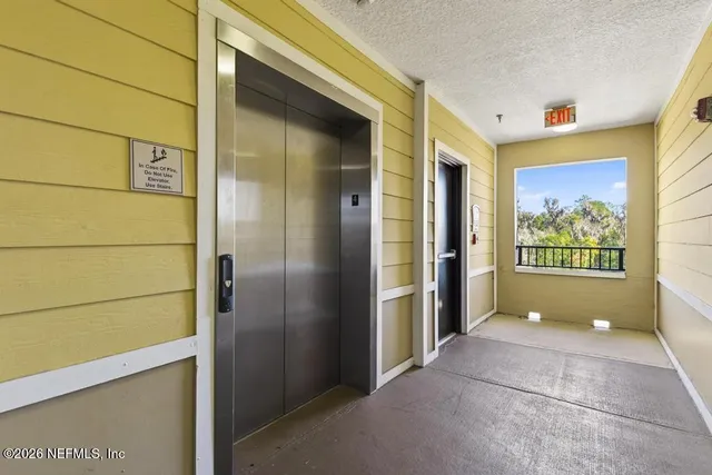 a view of a house with a street