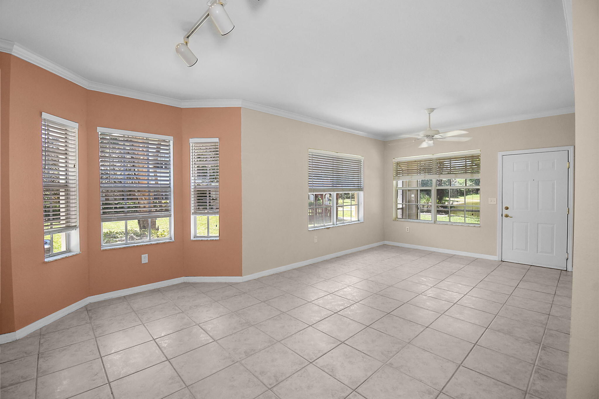 174 Southeast Kitching Circle, Unit 174 Stuart, FL 34994 - Photo 12 of 40 a view of an empty room with a window