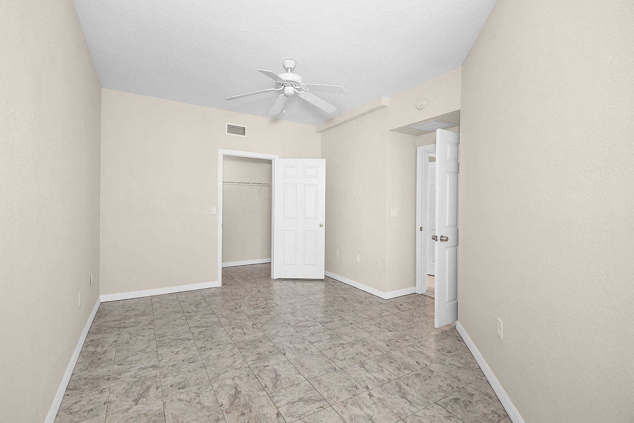174 Southeast Kitching Circle, Unit 174 Stuart, FL 34994 - Photo 30 of 40 a view of an empty room