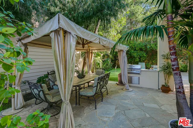 a view of an outdoor sitting area with chairs