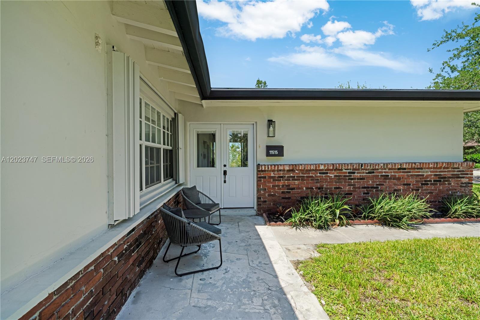 11515 Southwest 81st Road, Unit 11515 Pinecrest, FL 33156 - Photo 33 of 33 a view of an outdoor space with seating area