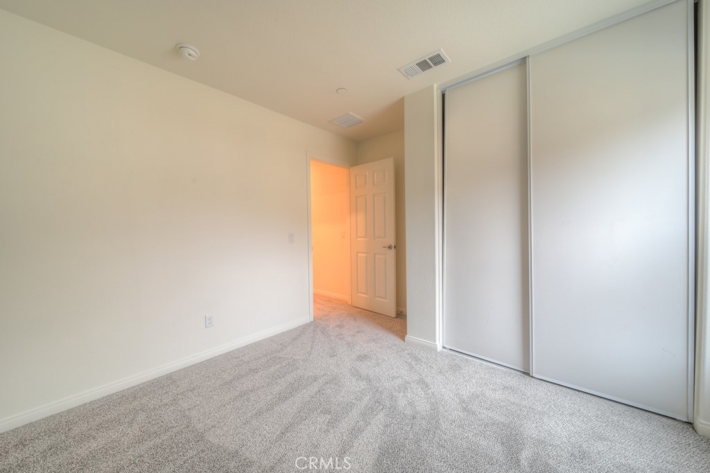 9596 Trailhead Lane Moreno Valley, CA 92557 - Photo 15 of 67 a view of an empty room