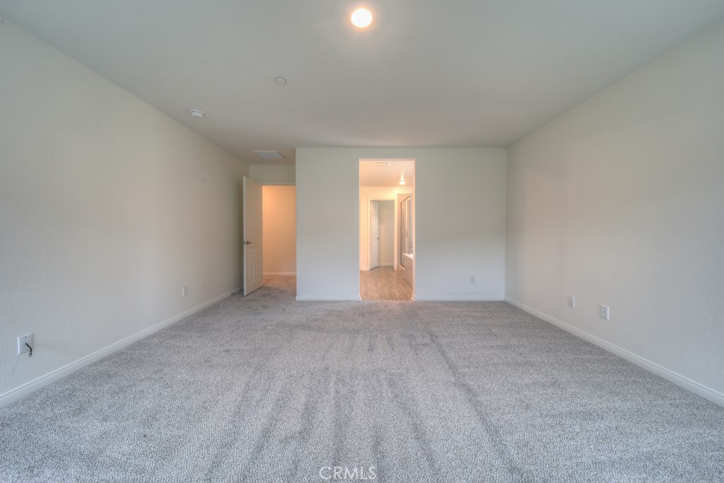 9596 Trailhead Lane Moreno Valley, CA 92557 - Photo 35 of 67 a view of an empty room and window