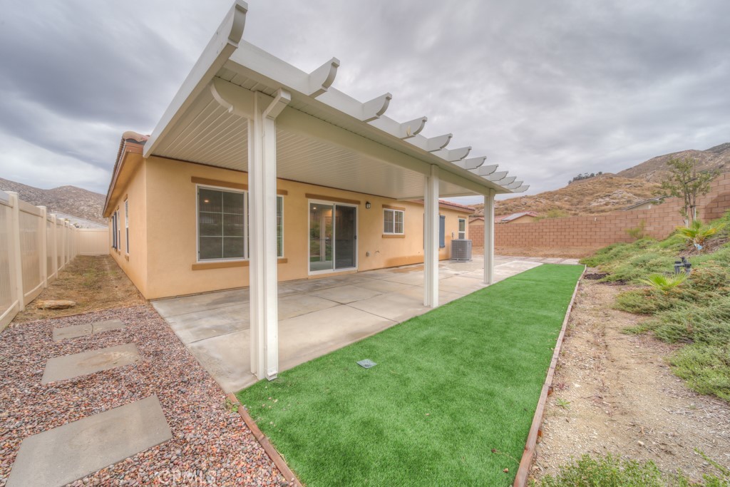 9596 Trailhead Lane Moreno Valley, CA 92557 - Photo 48 of 67 a view of a back yard of the house