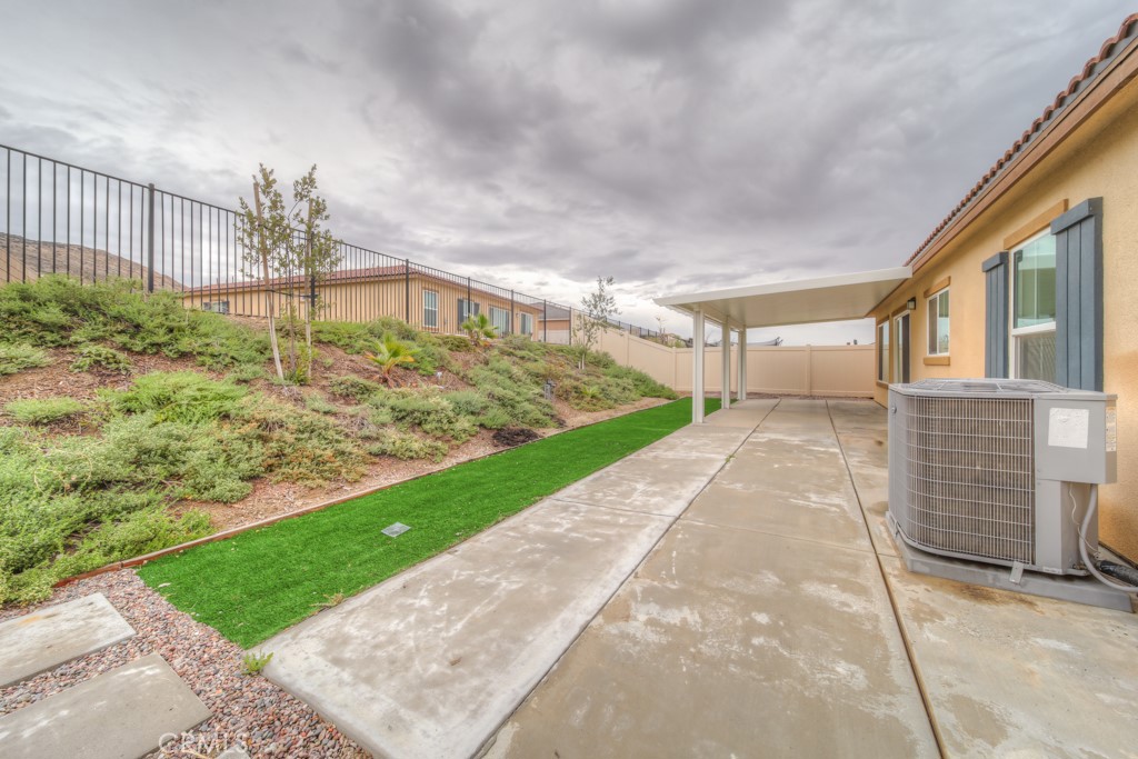 9596 Trailhead Lane Moreno Valley, CA 92557 - Photo 50 of 67 a view of a back yard of the house