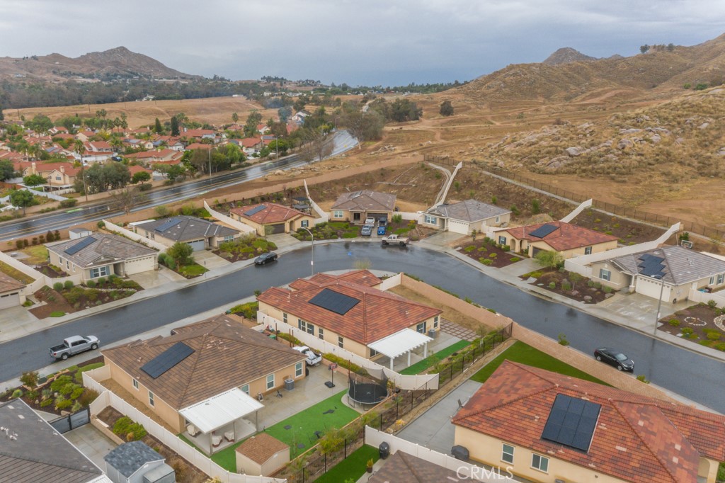 9596 Trailhead Lane Moreno Valley, CA 92557 - Photo 63 of 67 an aerial view of residential houses with outdoor space