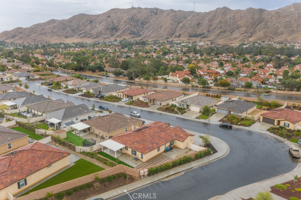 9596 Trailhead Lane Moreno Valley, CA 92557 - Photo 65 of 67 an aerial view of residential houses with outdoor space