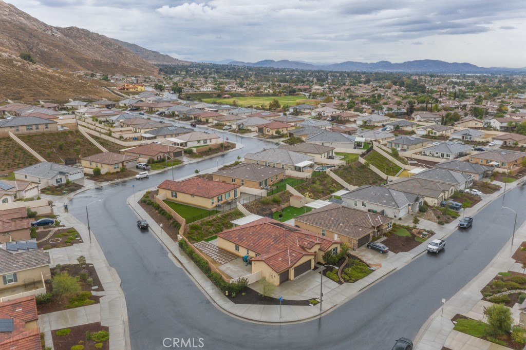 9596 Trailhead Lane Moreno Valley, CA 92557 - Photo 67 of 67 an aerial view of residential houses with outdoor space