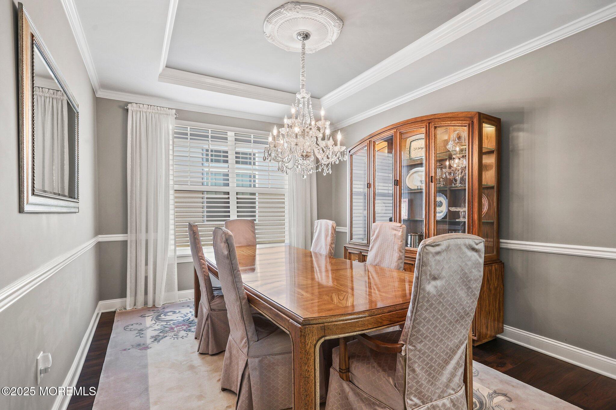 57 Harvest Ridge Road Howell, NJ 07731 - Photo 17 of 39 a view of a dining room with furniture window and wooden floor