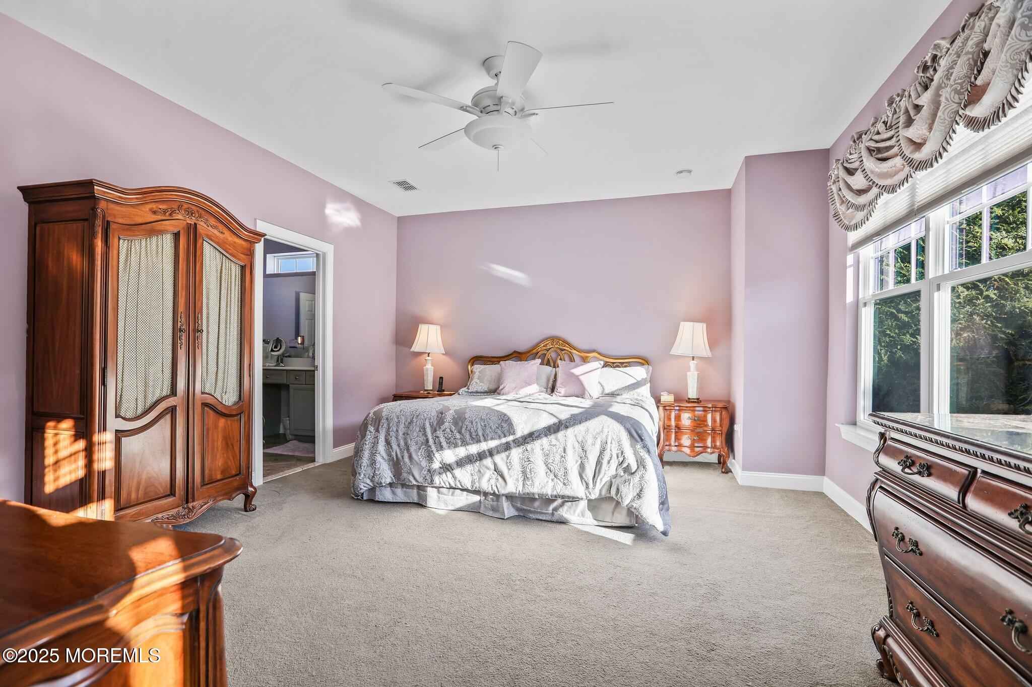 57 Harvest Ridge Road Howell, NJ 07731 - Photo 19 of 39 a bed room with a bed and a television