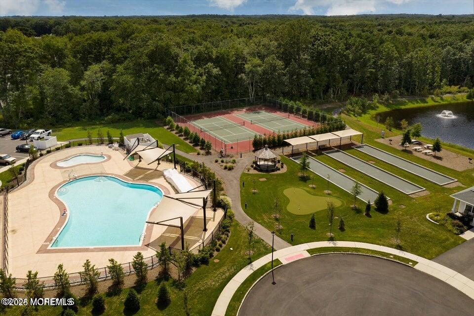 57 Harvest Ridge Road Howell, NJ 07731 - Photo 37 of 39 an aerial view of a house with yard swimming pool and outdoor seating