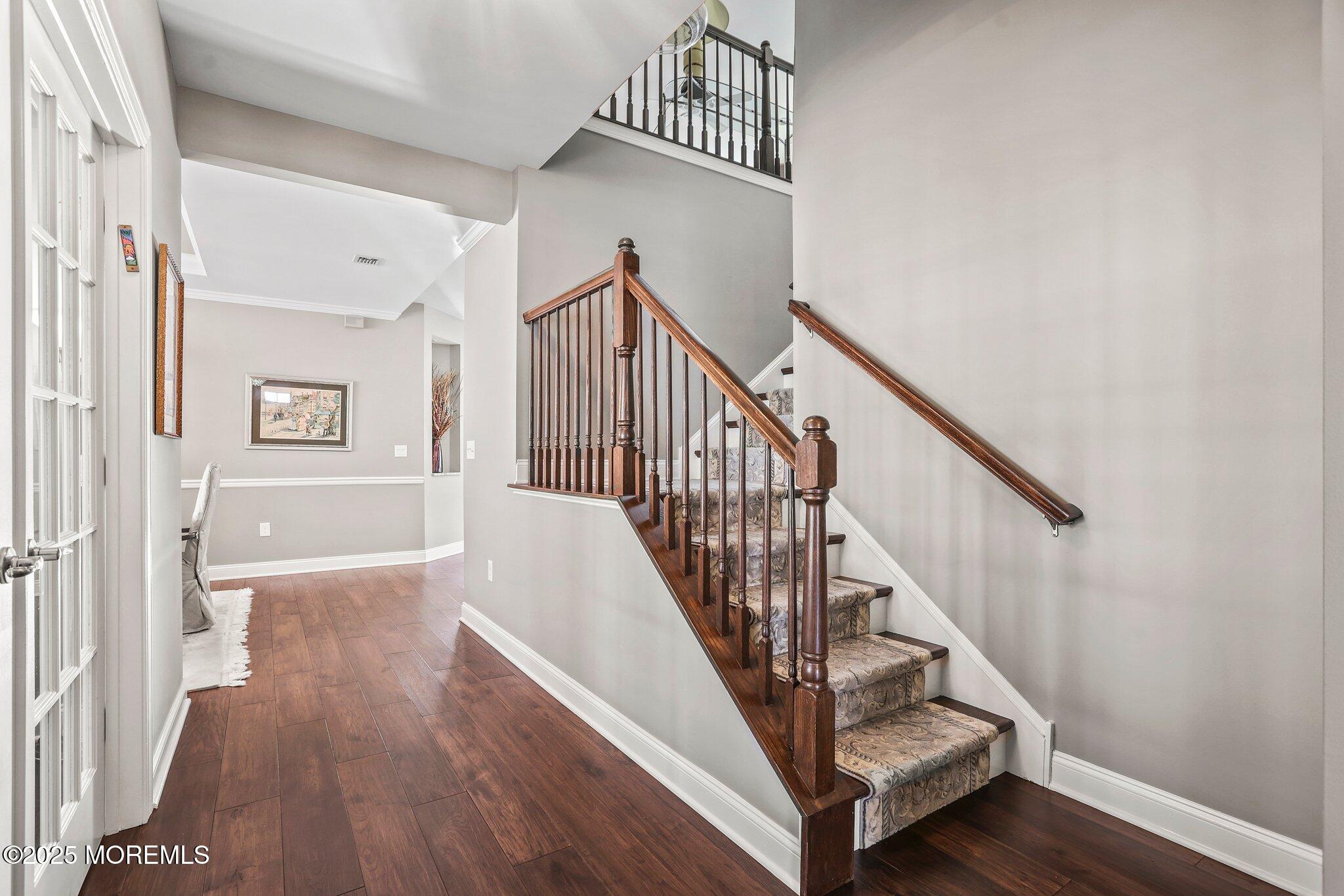 57 Harvest Ridge Road Howell, NJ 07731 - Photo 5 of 39 a view of entryway and hall with wooden floor