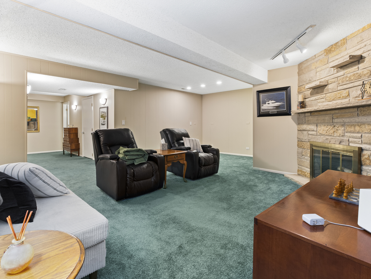186 Shoreline Road Lake Barrington, IL 60010 - Photo 20 of 25 a living room with furniture and a fireplace