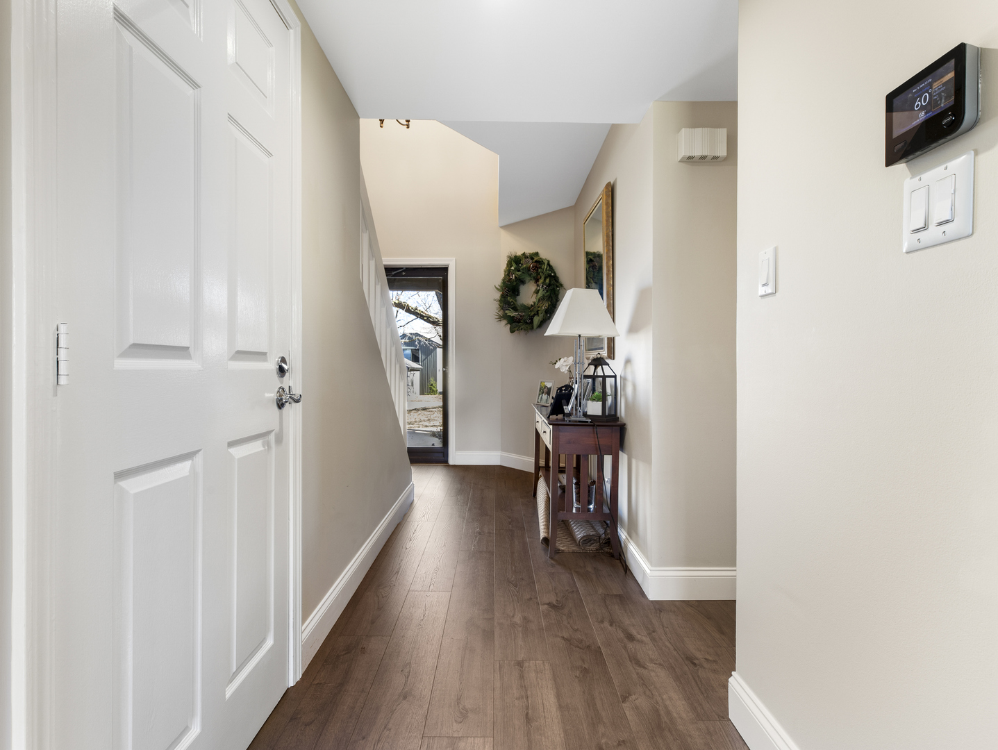 186 Shoreline Road Lake Barrington, IL 60010 - Photo 9 of 25 a view of entryway and hall with wooden floor