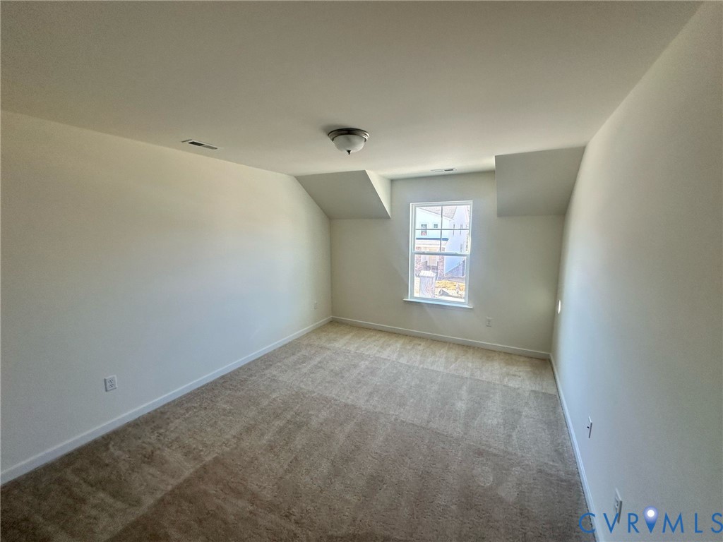 12737 Deep Wl Road Midlothian, VA 23112 - Photo 15 of 17 an empty room with windows
