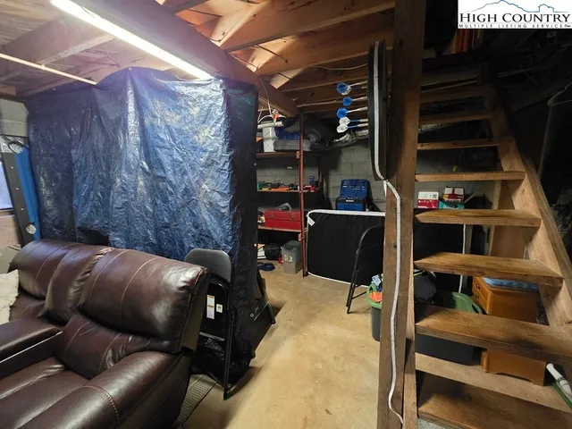 a view of a yard with a house in the background