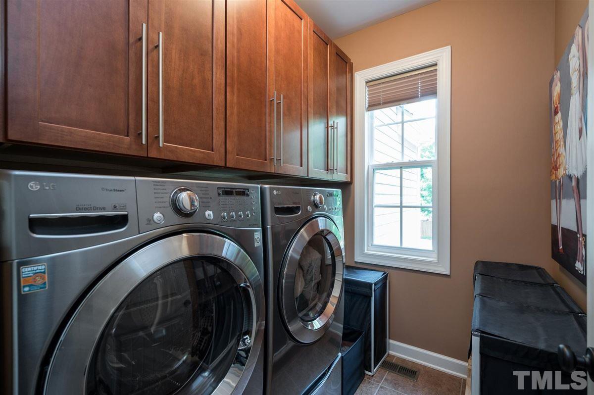 1004 Bianco Drive Raleigh, NC 27607 - Photo 24 of 30 a utility room with dryer and washer