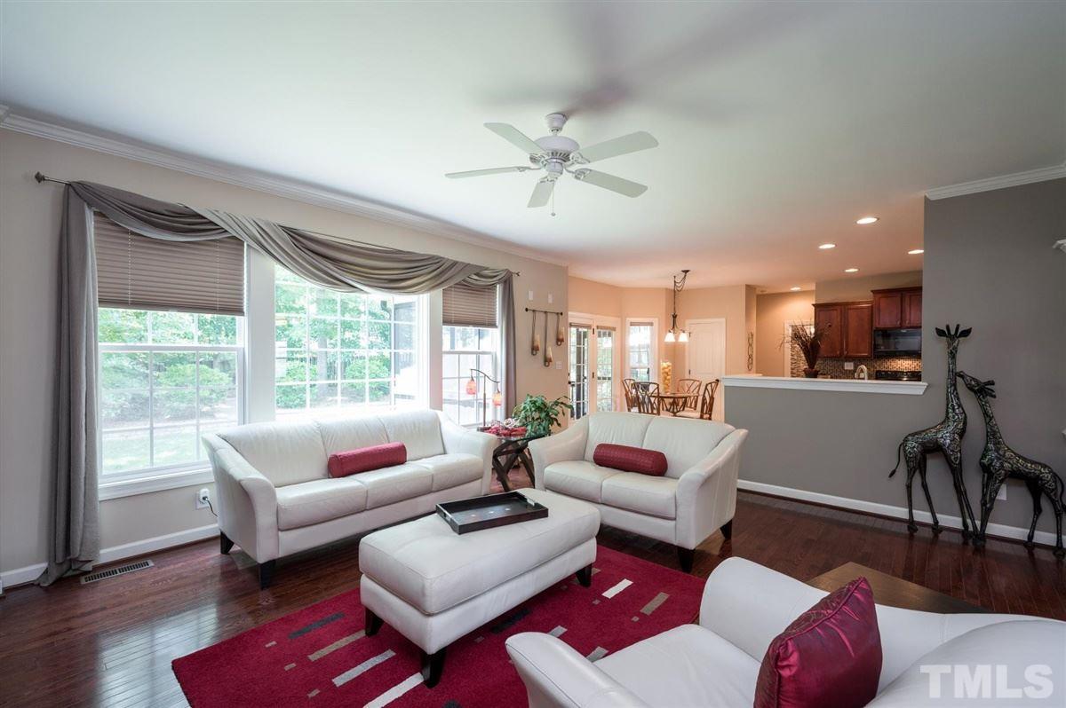 1004 Bianco Drive Raleigh, NC 27607 - Photo 7 of 30 a living room with furniture and a large window