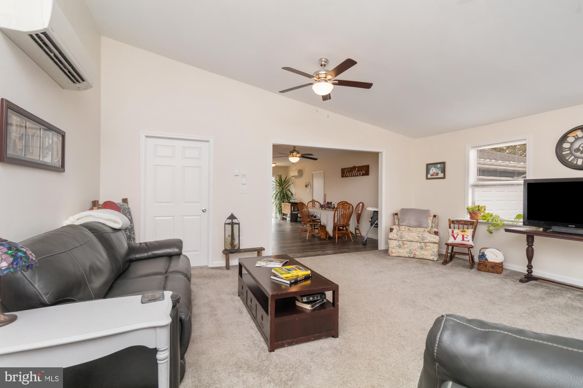 281 Adams Road Port Deposit, MD 21904 - Photo 3 of 45 a living room with furniture and a flat screen tv