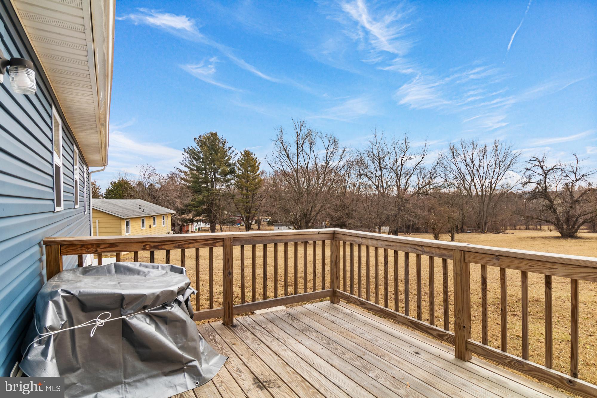 281 Adams Road Port Deposit, MD 21904 - Photo 39 of 45 a view of a roof deck with wooden floor and fence