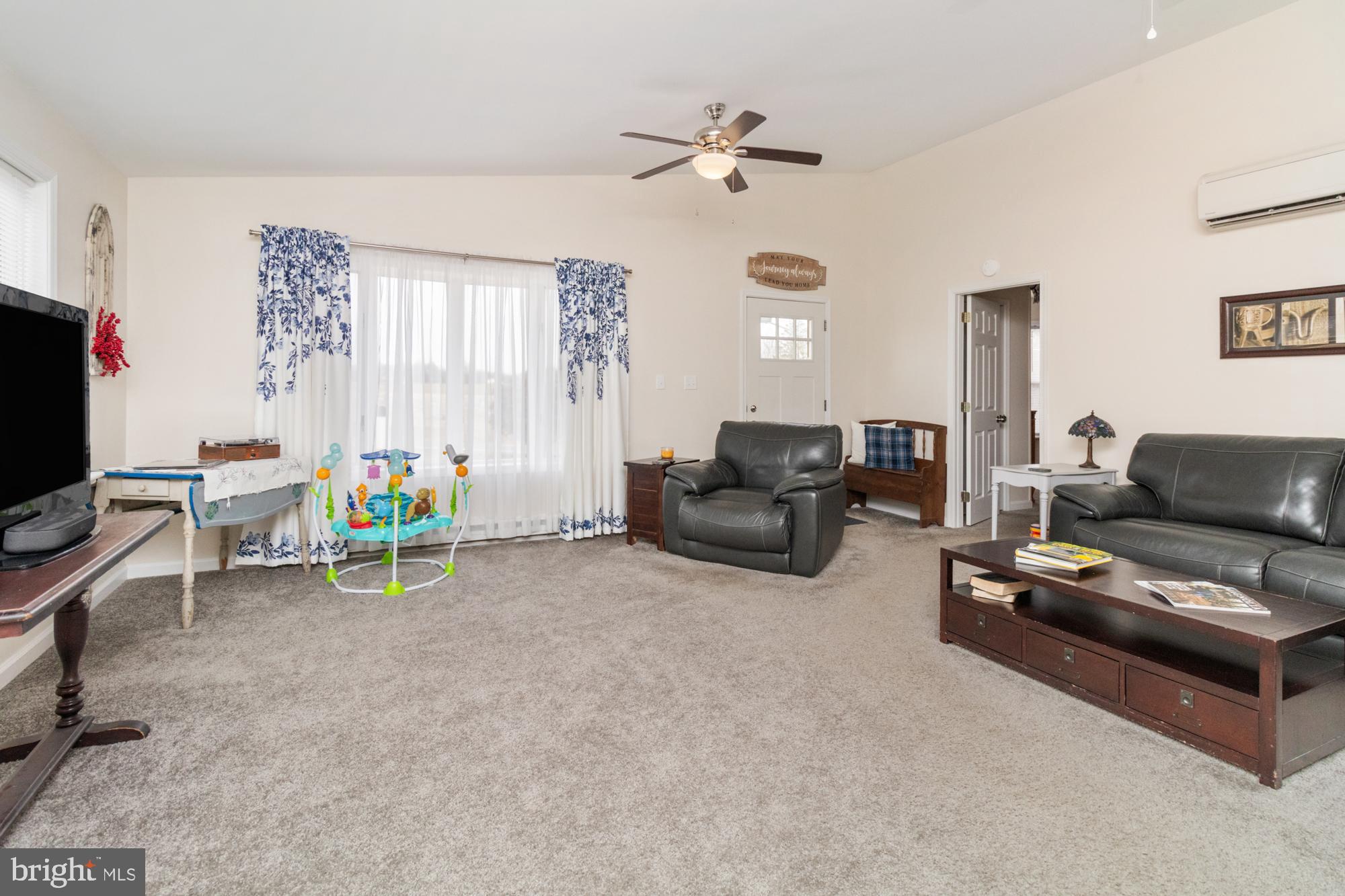 281 Adams Road Port Deposit, MD 21904 - Photo 5 of 45 a living room with furniture and a flat screen tv