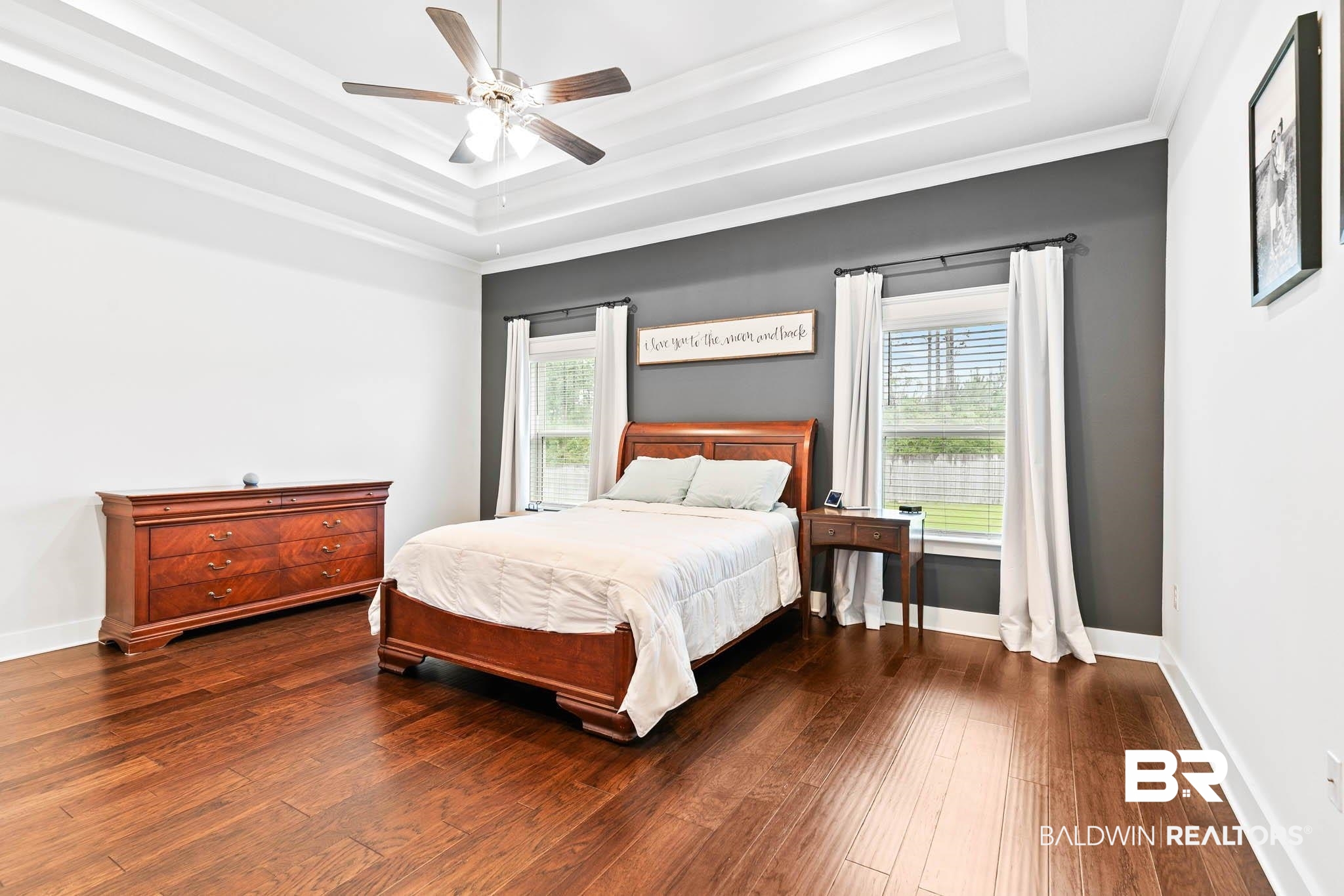 12785 Warbler Street Daphne, AL 36527 - Photo 14 of 53 Bedroom with a raised ceiling, dark wood-type flooring, and a ceiling fan