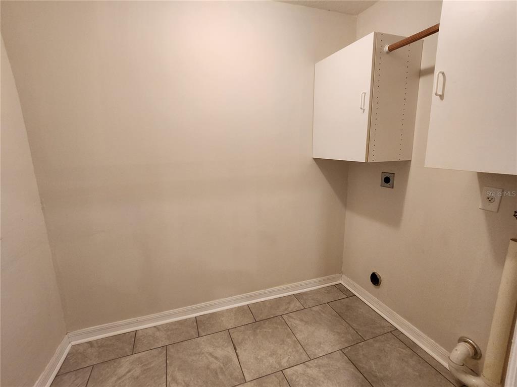 6521 East Grayson Street Inverness, FL 34452 - Photo 6 of 16 a bathroom with a shower