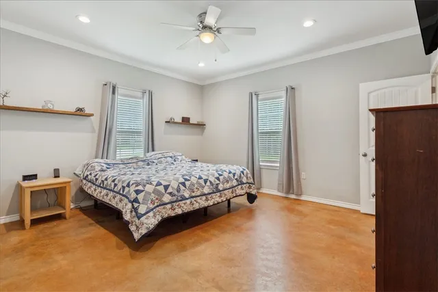 a bathroom with a granite countertop sink and a wooden cabinets