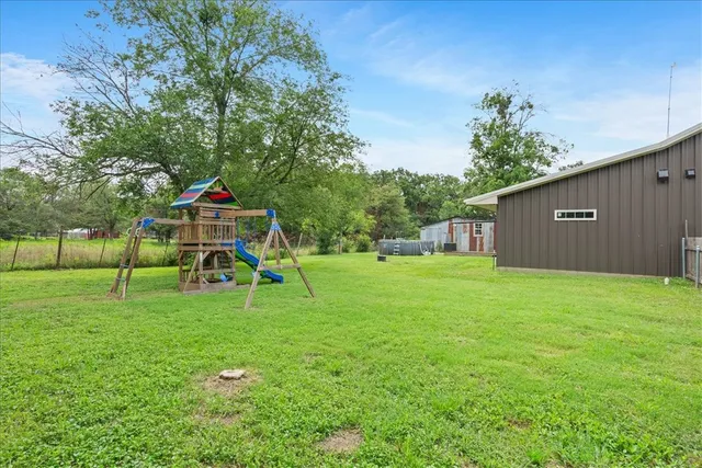 a house view with a garden space