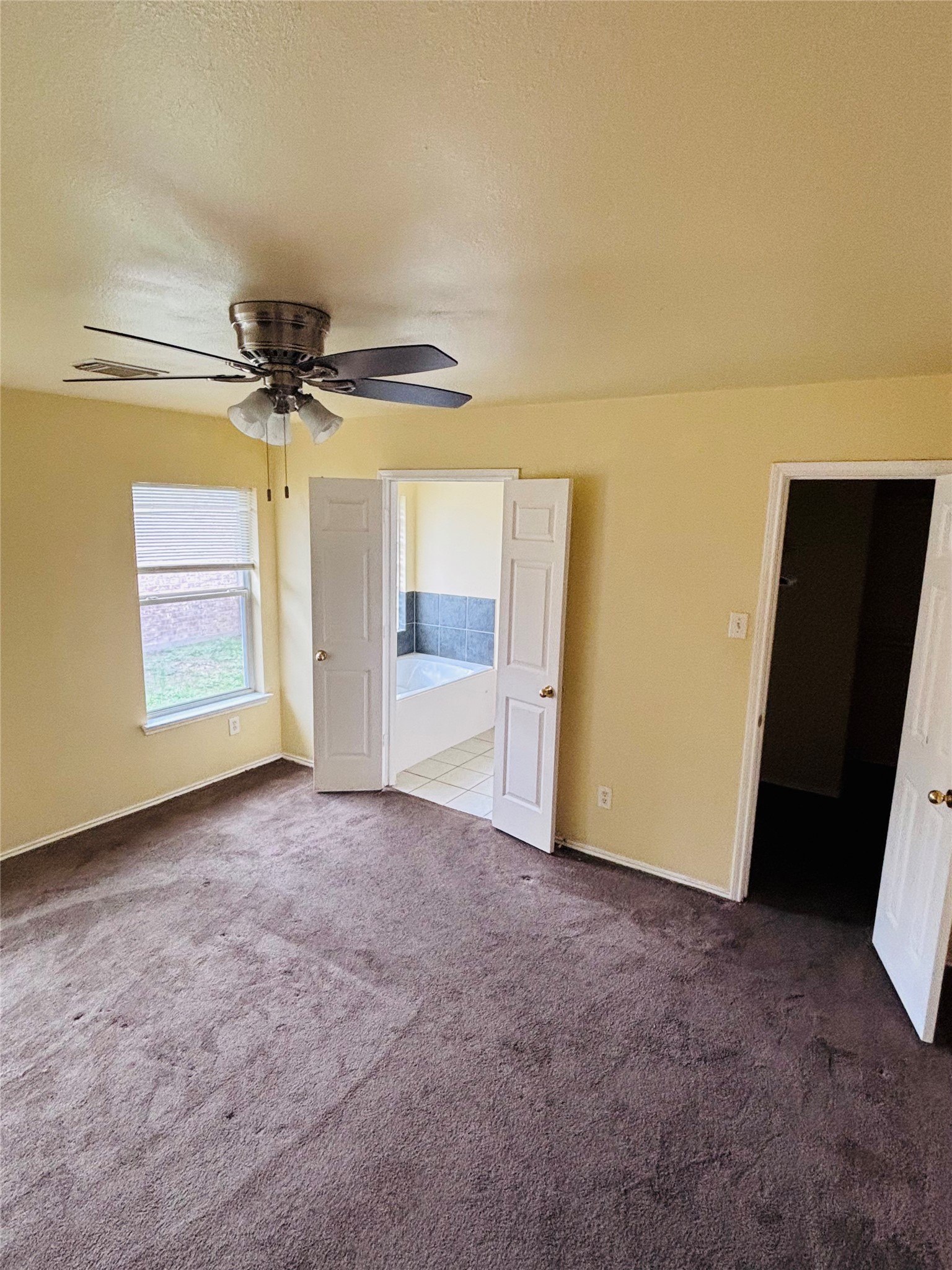 6402 Hayman Drive Katy, TX 77449 - Photo 5 of 9 a view of an empty room with a window