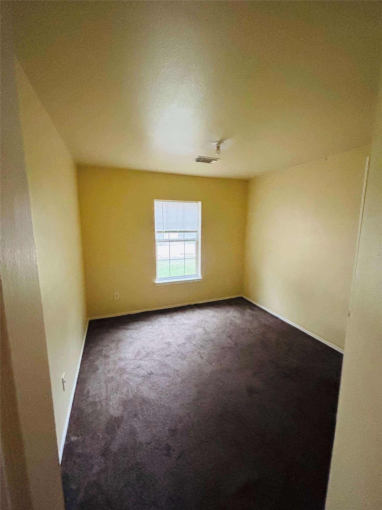 6402 Hayman Drive Katy, TX 77449 - Photo 7 of 9 an empty room with a window