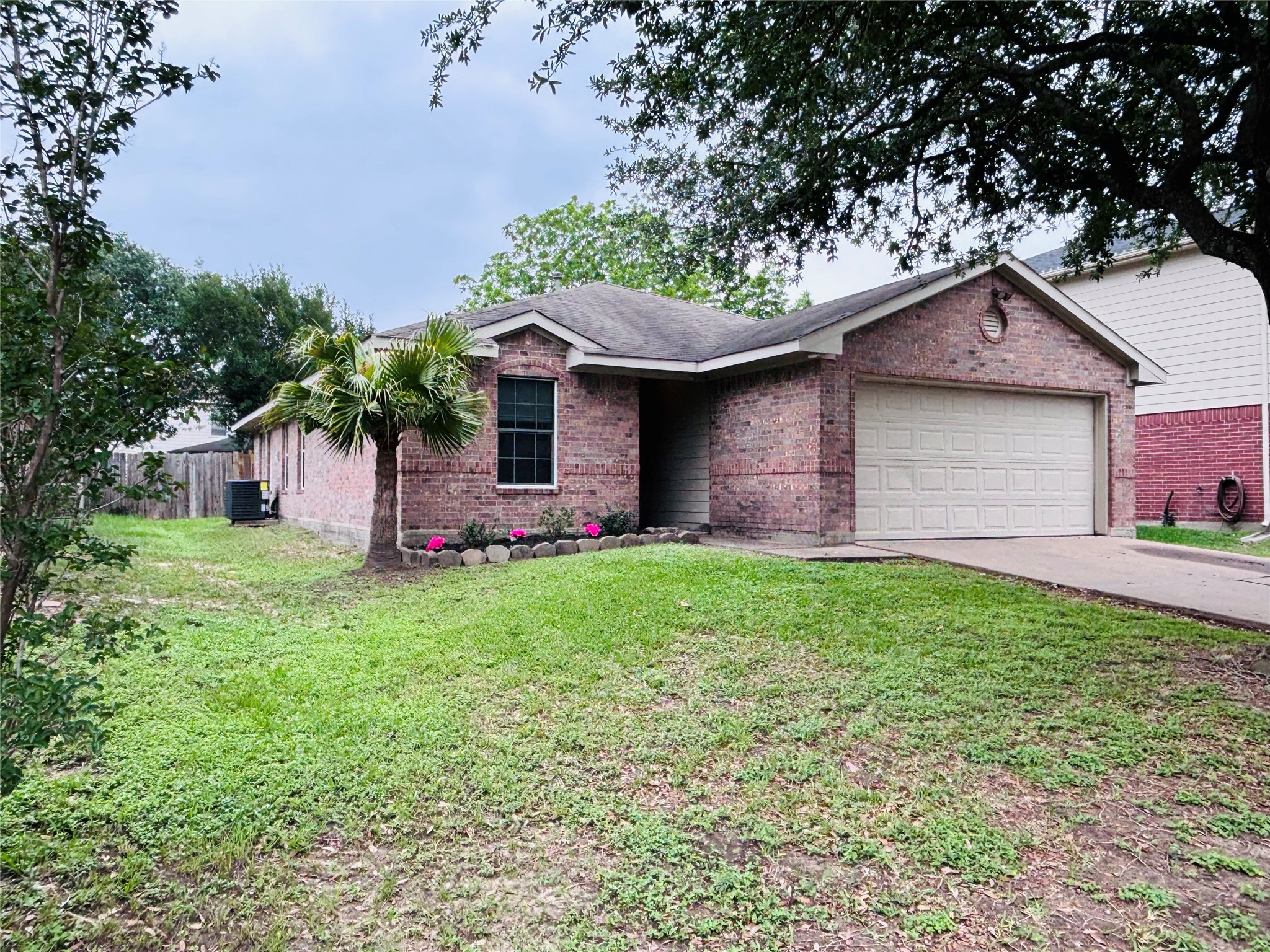 6402 Hayman Drive Katy, TX 77449 - Photo 9 of 9 a front view of house with yard and green space