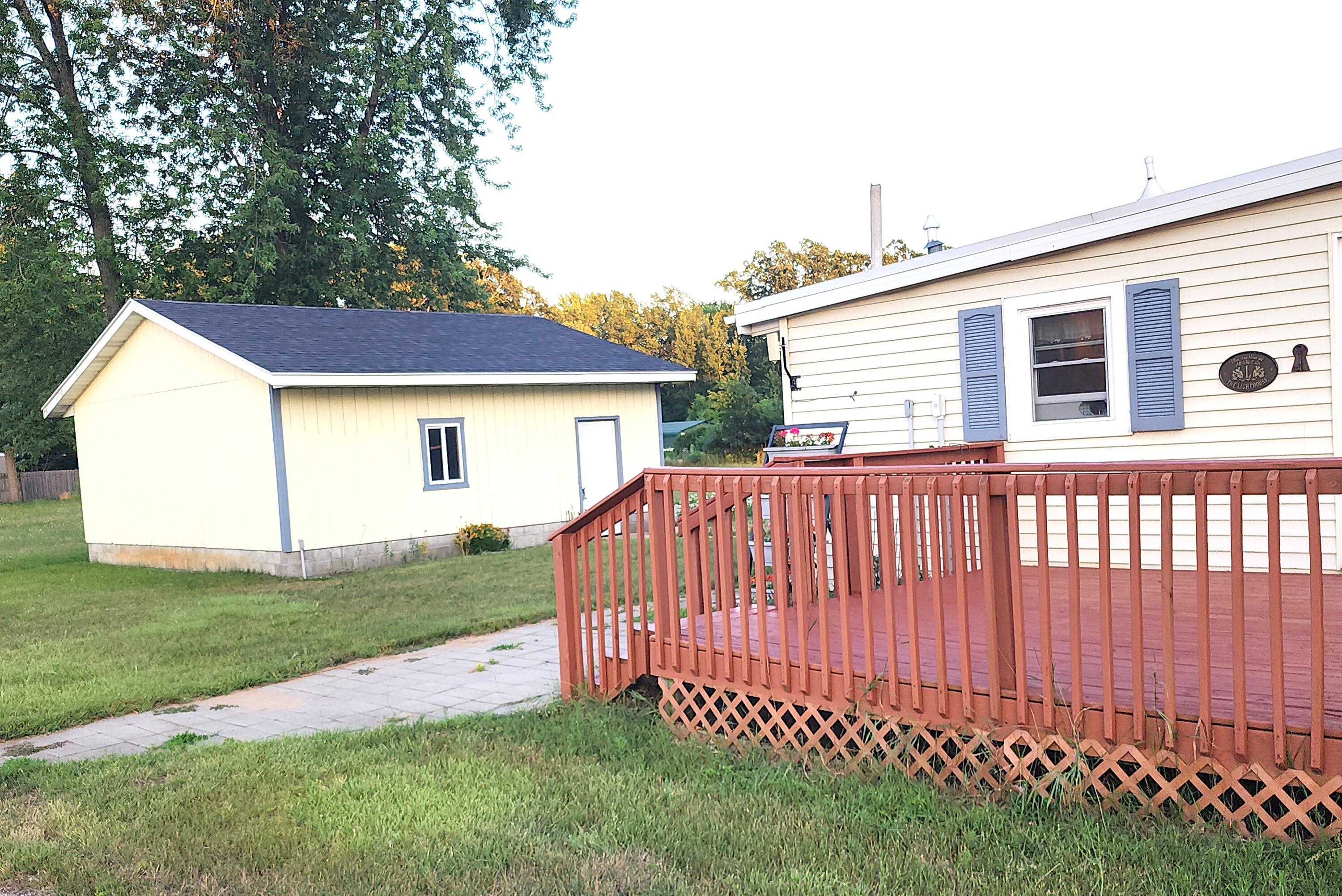 1150 Quarterline Road Muskegon, MI 49442 - Photo 4 of 20 Other Side View
