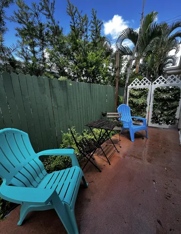 a view of a chairs in patio