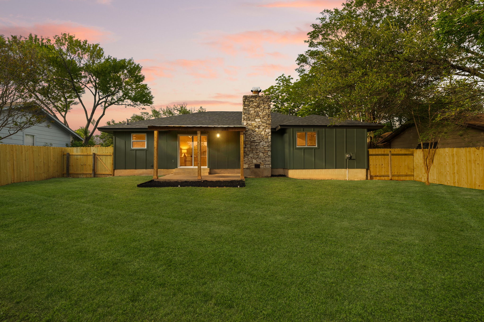2107 Cindy Lane Austin, TX 78727 - Photo 33 of 33 Expansive lawn with a newly installed wood fence