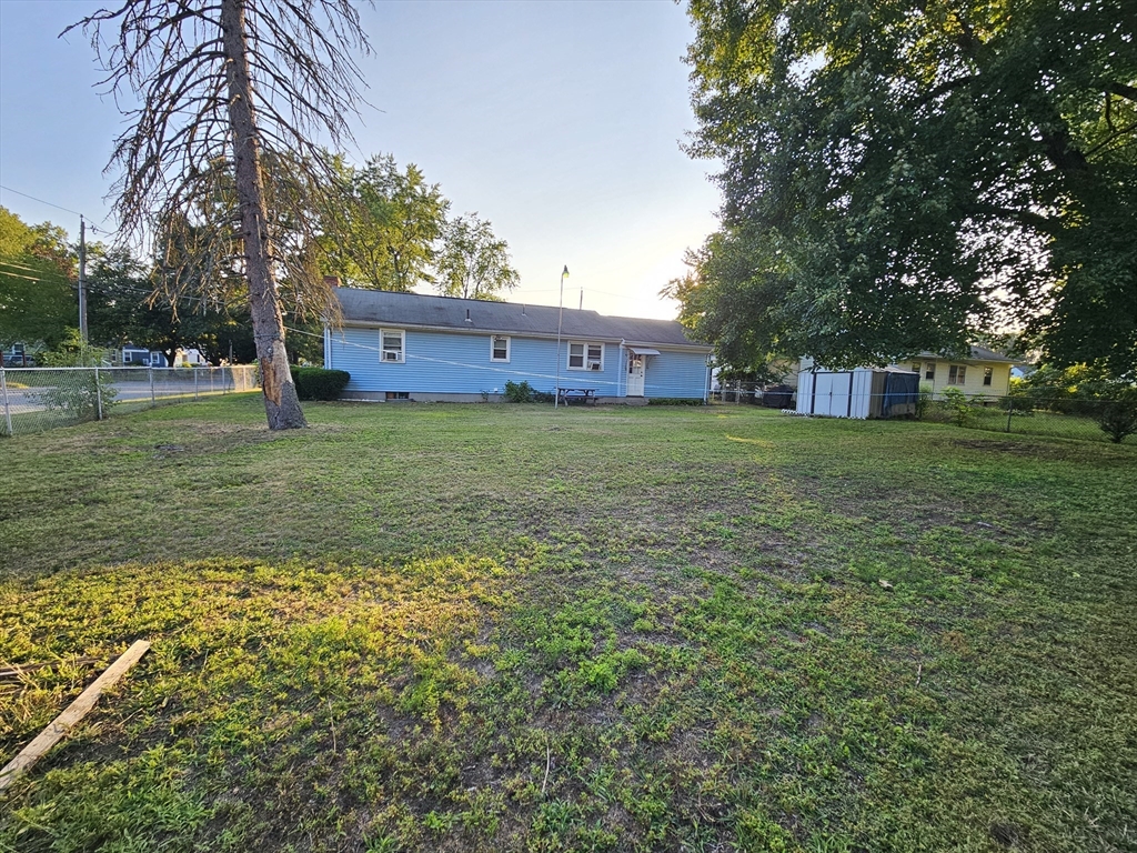 45 Dimmick Street Springfield, MA 01109 - Photo 7 of 22 a view of a yard with a house