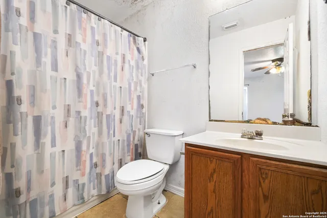 a bathroom with a sink and a toilet
