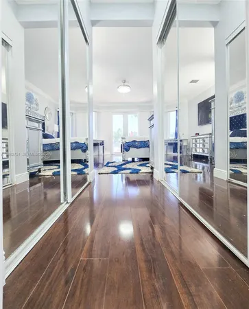 a bathroom with a sink a vanity and a mirror