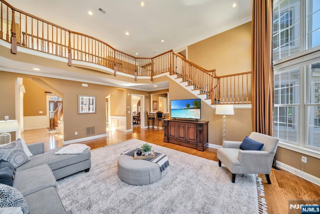 28 Arbor Road North Caldwell, NJ 07006 - Photo 17 of 50 a living room with furniture and a large window