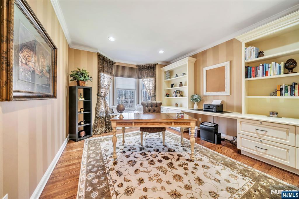 28 Arbor Road North Caldwell, NJ 07006 - Photo 19 of 50 a living room with stainless steel appliances granite countertop furniture a rug and a window