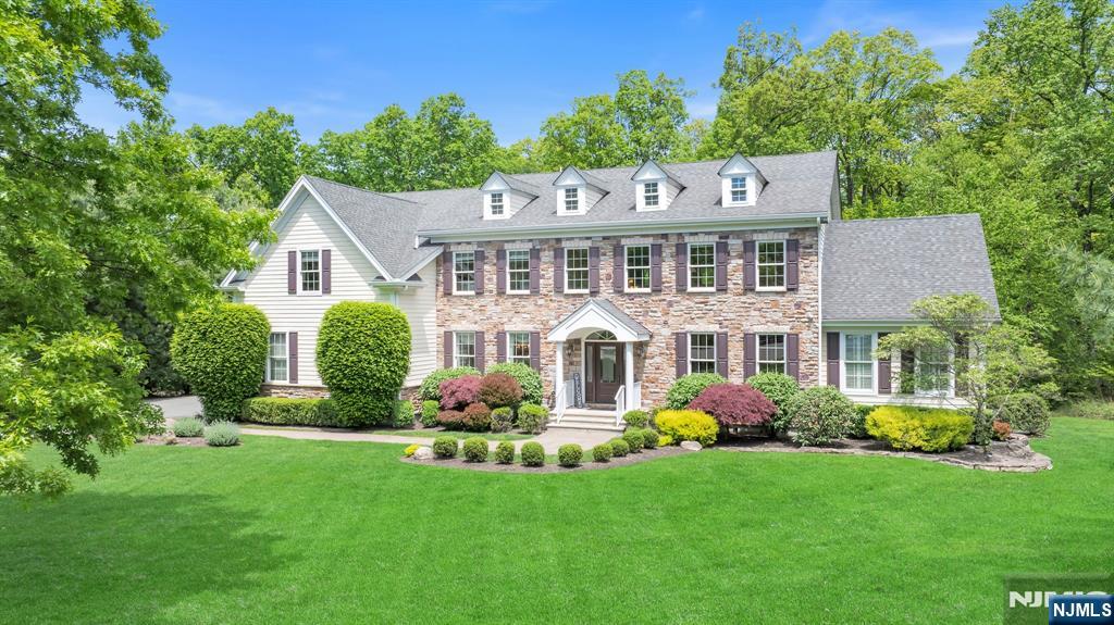 28 Arbor Road North Caldwell, NJ 07006 - Photo 2 of 50 front view of a house with a yard