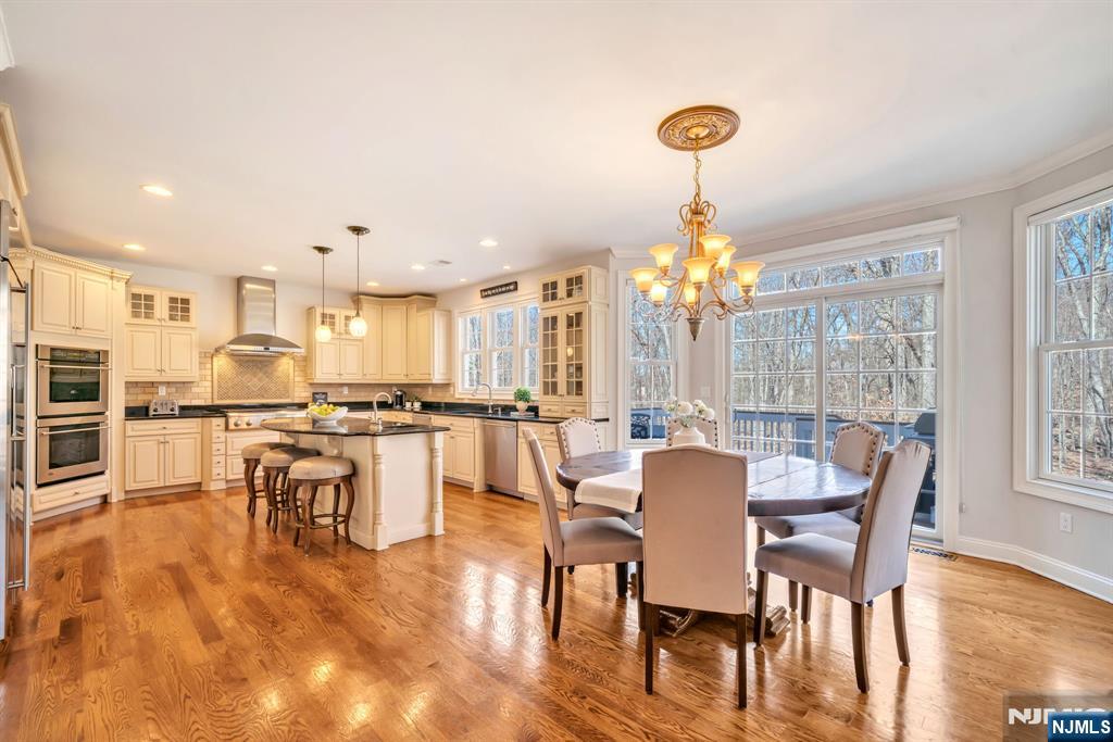 28 Arbor Road North Caldwell, NJ 07006 - Photo 22 of 50 a view of a dining room with furniture window and outside view