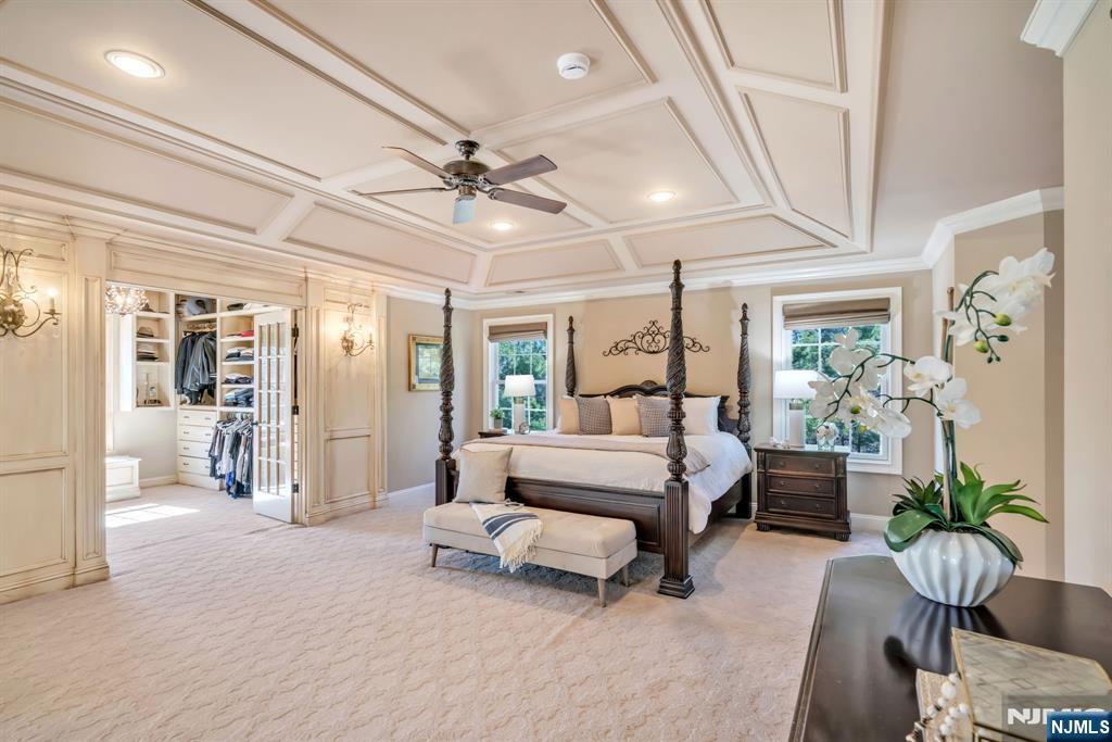 28 Arbor Road North Caldwell, NJ 07006 - Photo 29 of 50 a living room with furniture and a chandelier