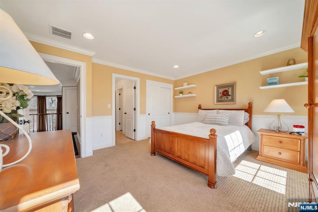 28 Arbor Road North Caldwell, NJ 07006 - Photo 40 of 50 a bed room with a bed and a couch