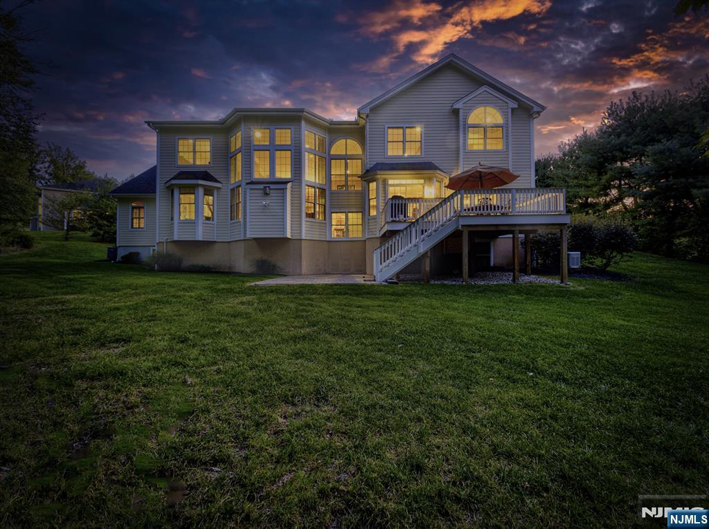 28 Arbor Road North Caldwell, NJ 07006 - Photo 50 of 50 a front view of a house with a yard