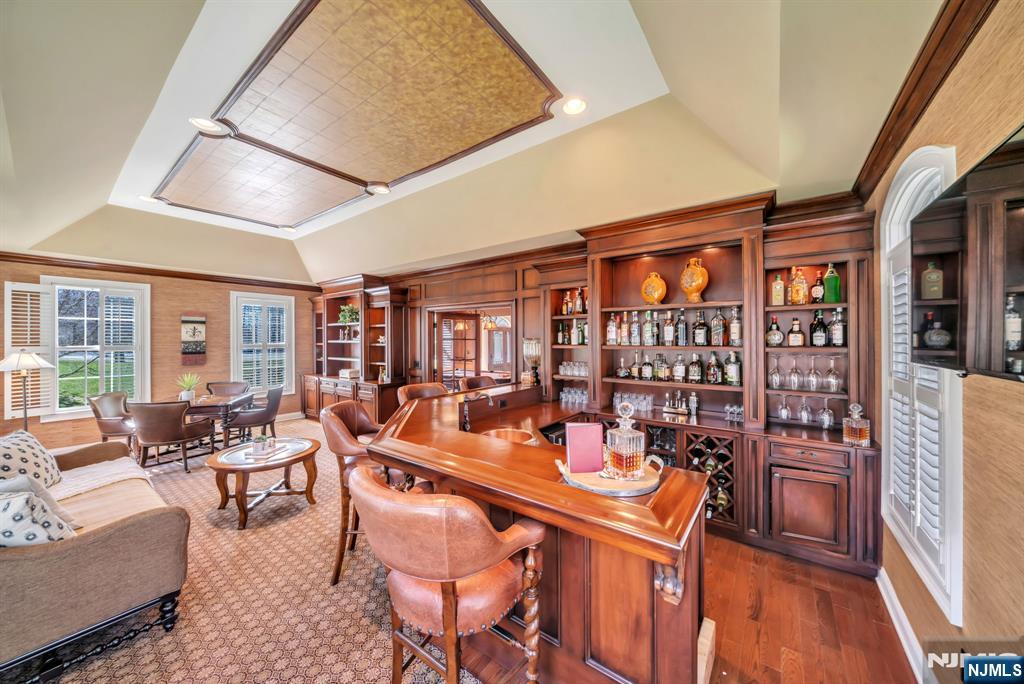 28 Arbor Road North Caldwell, NJ 07006 - Photo 7 of 50 a outdoor dining space with furniture and wooden floor